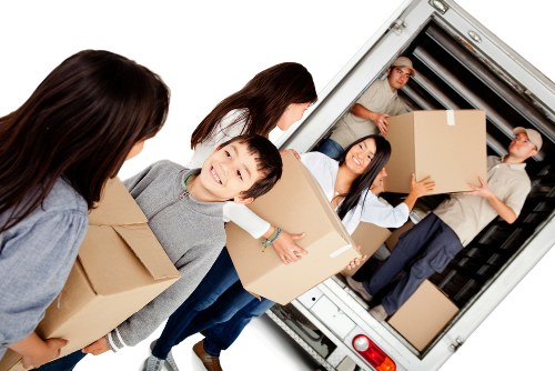 Customer interacting with removals team