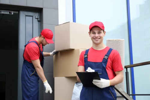 Front view of moving truck and packed boxes