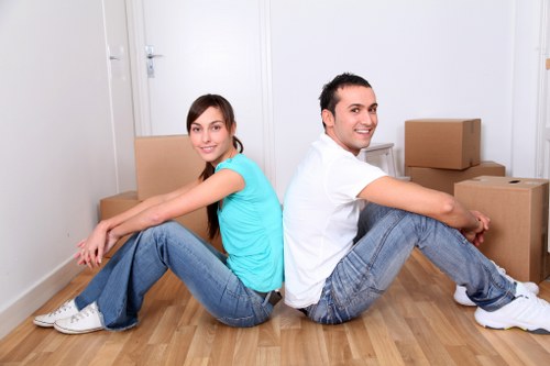 Packers organizing items for a move